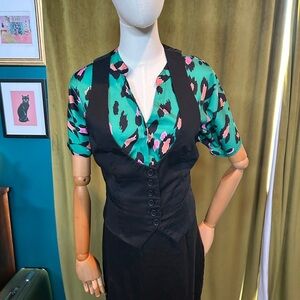 New York & Company Black Vest with buttons and pockets adjustable back size 10